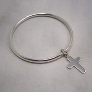sterling silver bangle with cross drop