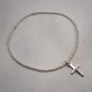 sterling silver stretch bracelet with cross